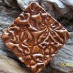Speckled rust stoneware cla..