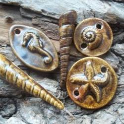 Seashell ,starfish ,seahorse and sand dollar pendants links cab